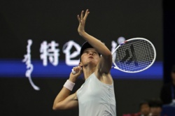 Popis Igi Świątek w chińskim Wuhan